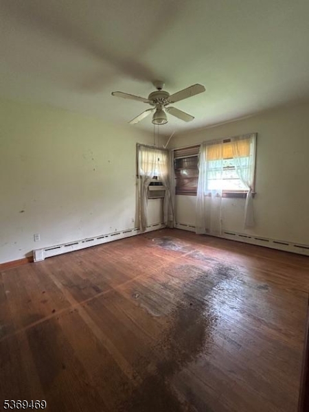 2044 Washington Valley Road Bridgewater, NJ 08836 - Photo 13 of 16 an empty room with windows and fan