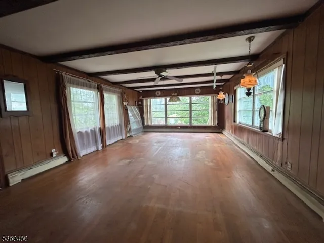 wooden floor and windows in an empty room