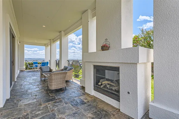 a view of a house with swimming pool and a yard
