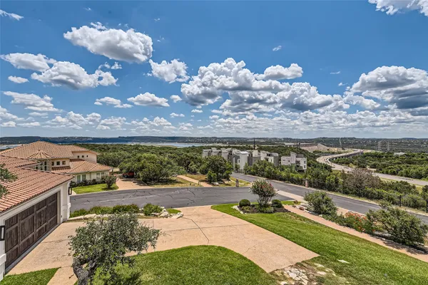 a view of a lake from a balcony