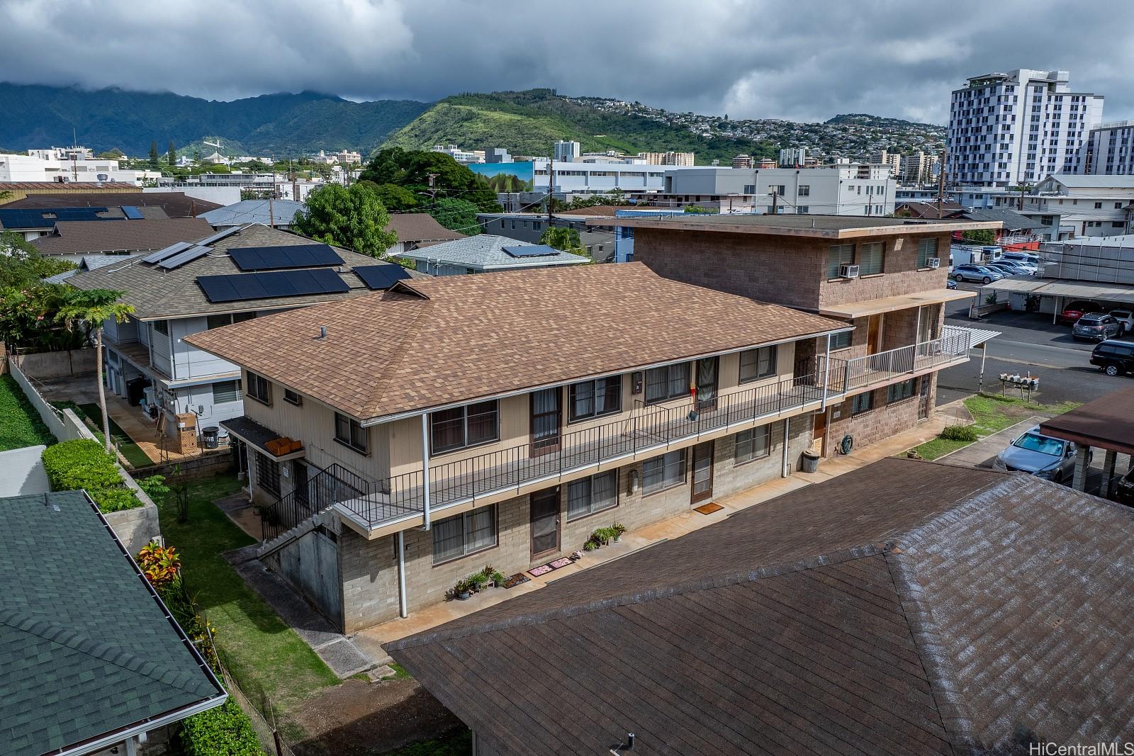 906 Hausten Street Honolulu, HI 96826 - Photo 11 of 21 a aerial view of a house with a swimming pool