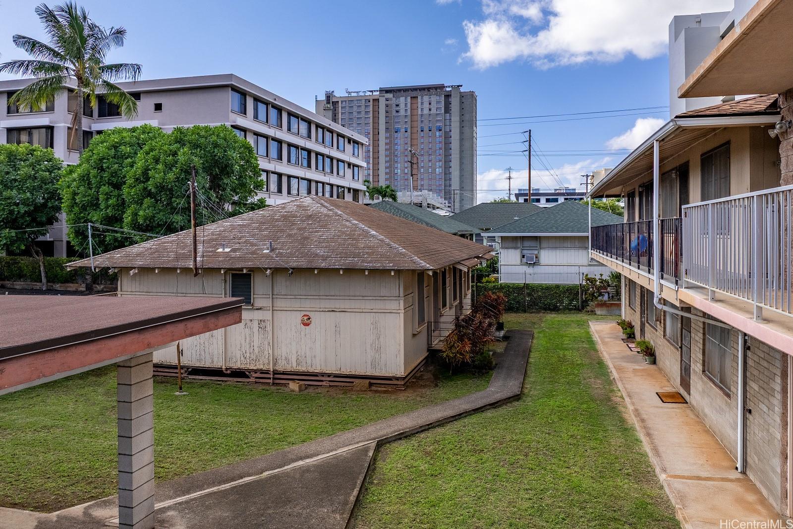 906 Hausten Street Honolulu, HI 96826 - Photo 16 of 21 a view of a house with a yard