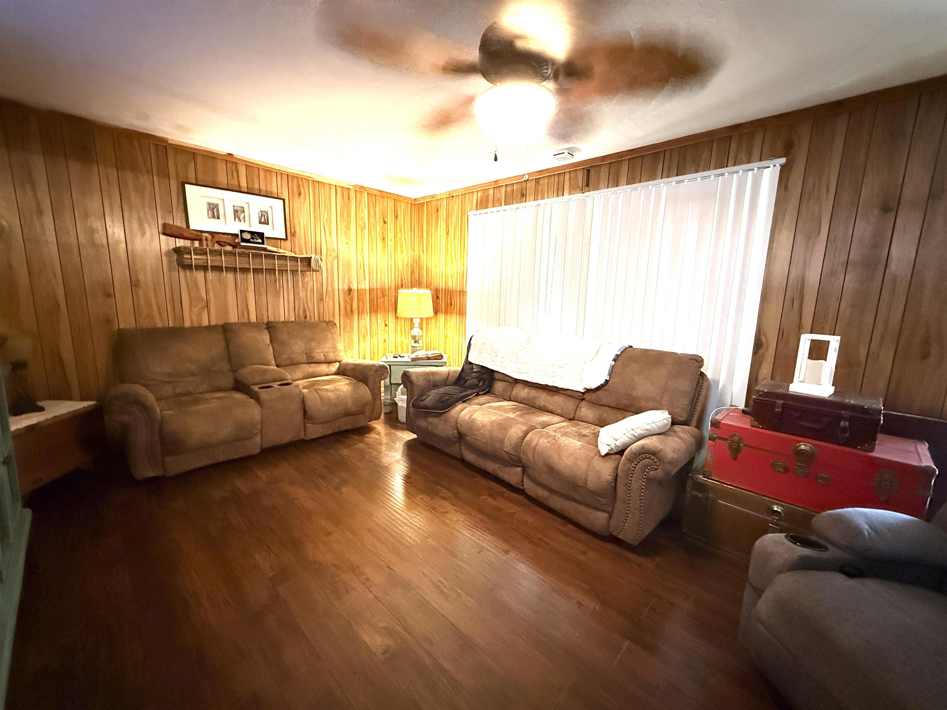 127 Harvey Newman Road Gates, TN 38037 - Photo 14 of 40 a living room with furniture and a large window
