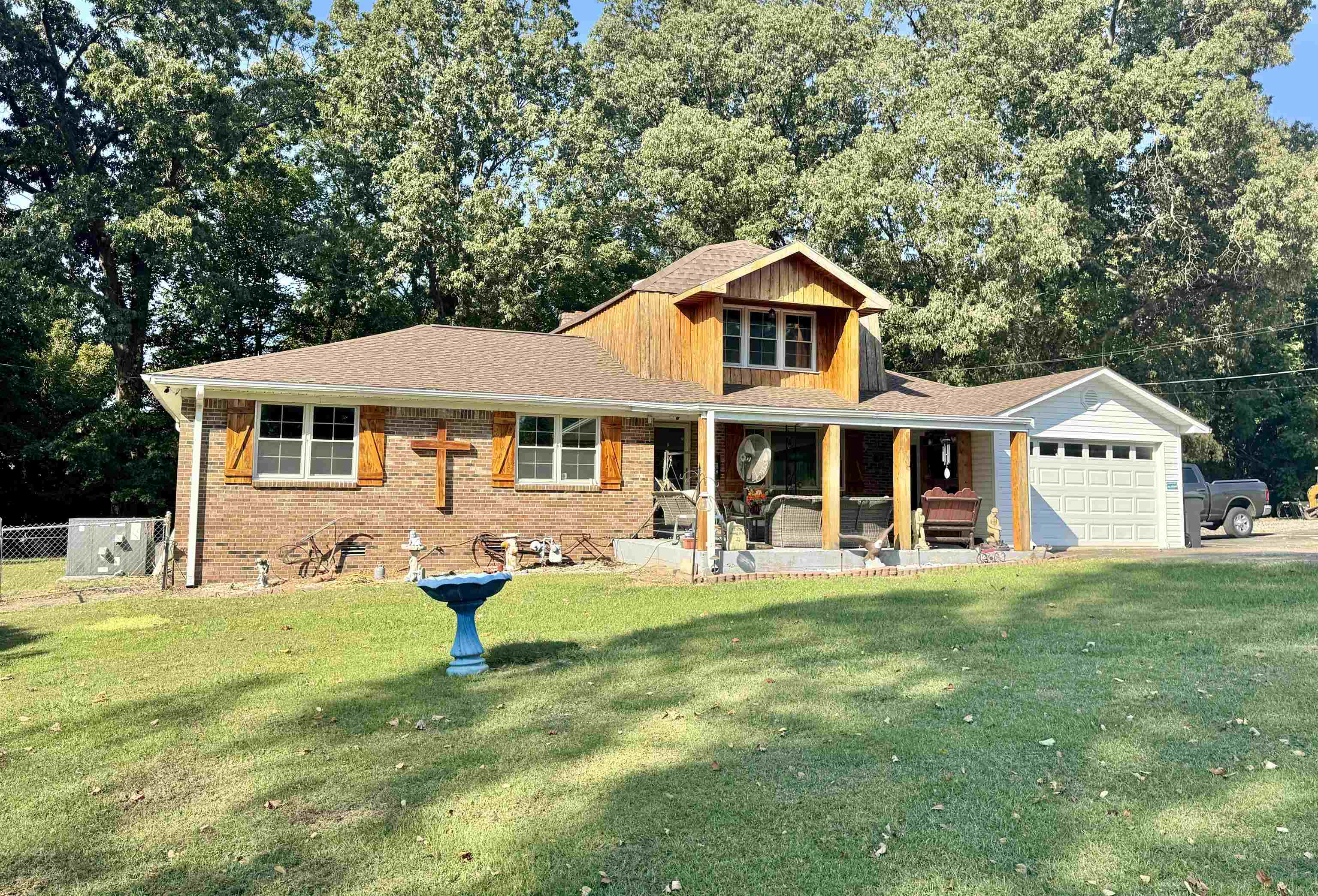 127 Harvey Newman Road Gates, TN 38037 - Photo 2 of 40 a front view of a house with a yard