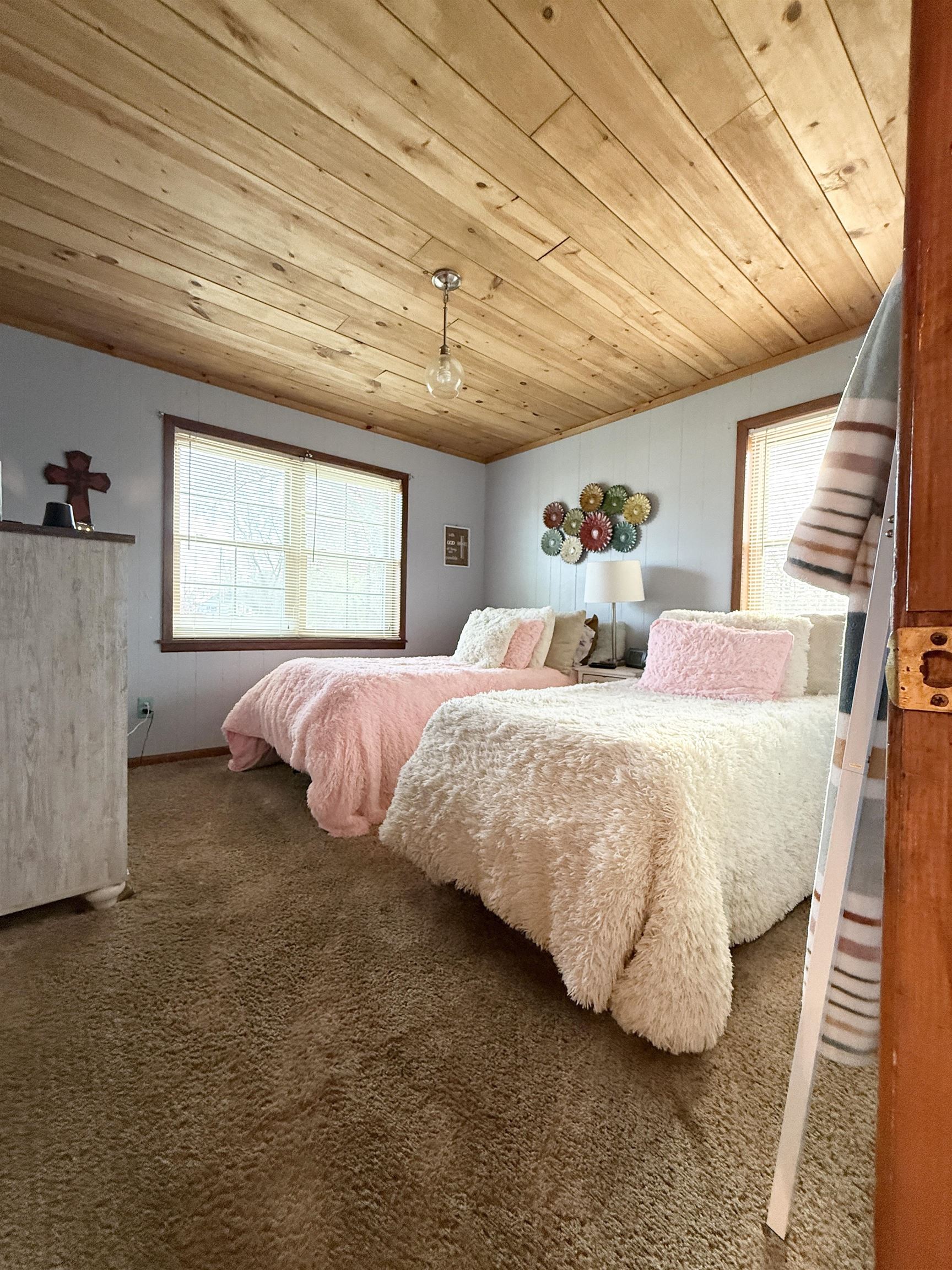 127 Harvey Newman Road Gates, TN 38037 - Photo 21 of 40 a bedroom with a bed and a large window