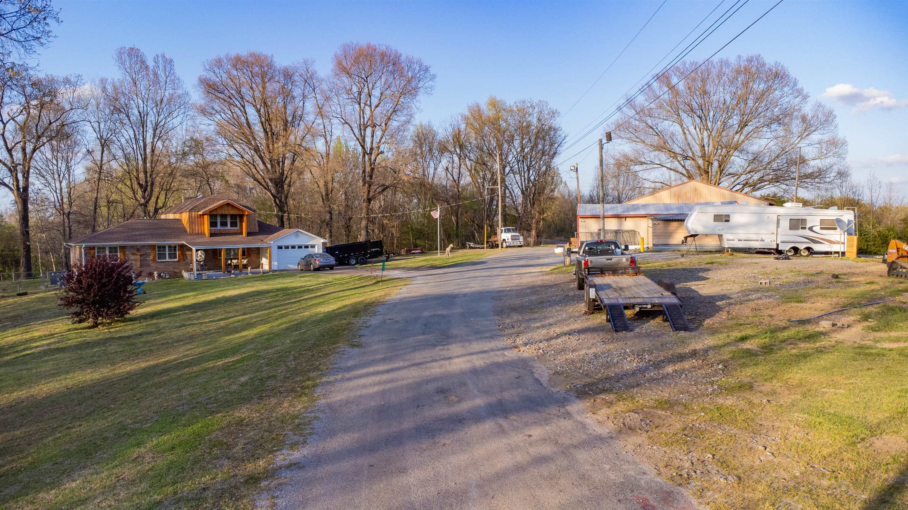 127 Harvey Newman Road Gates, TN 38037 - Photo 34 of 40 a view of a house with a yard