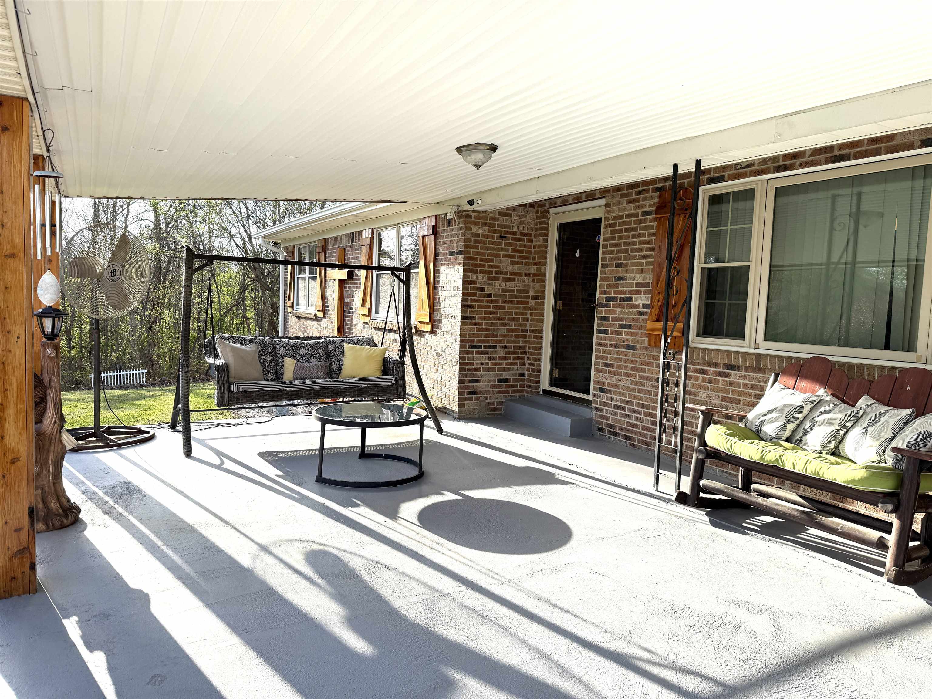 127 Harvey Newman Road Gates, TN 38037 - Photo 40 of 40 a building outdoor space with patio furniture and garden