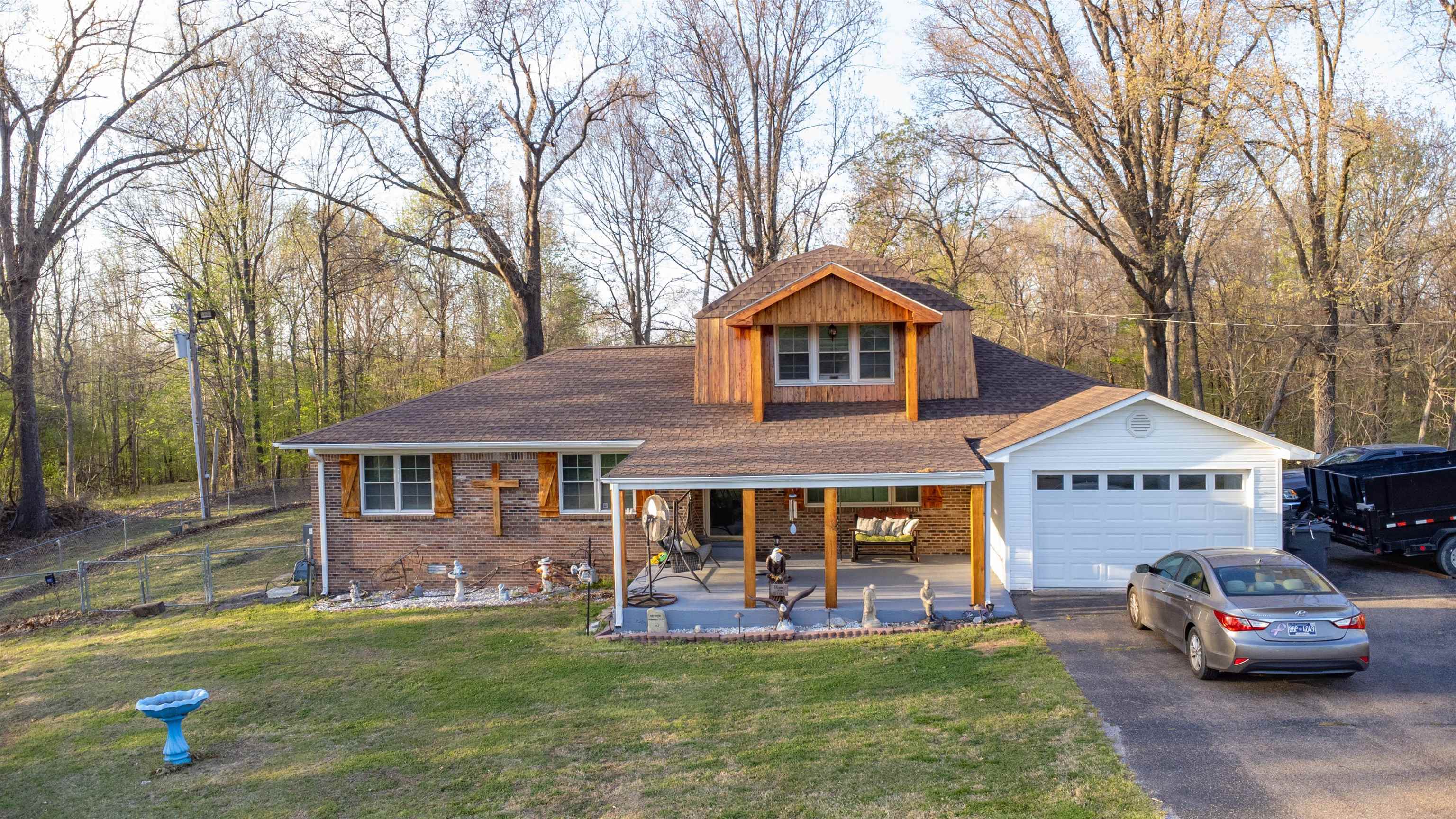127 Harvey Newman Road Gates, TN 38037 - Photo 4 of 40 a front view of a house with garden
