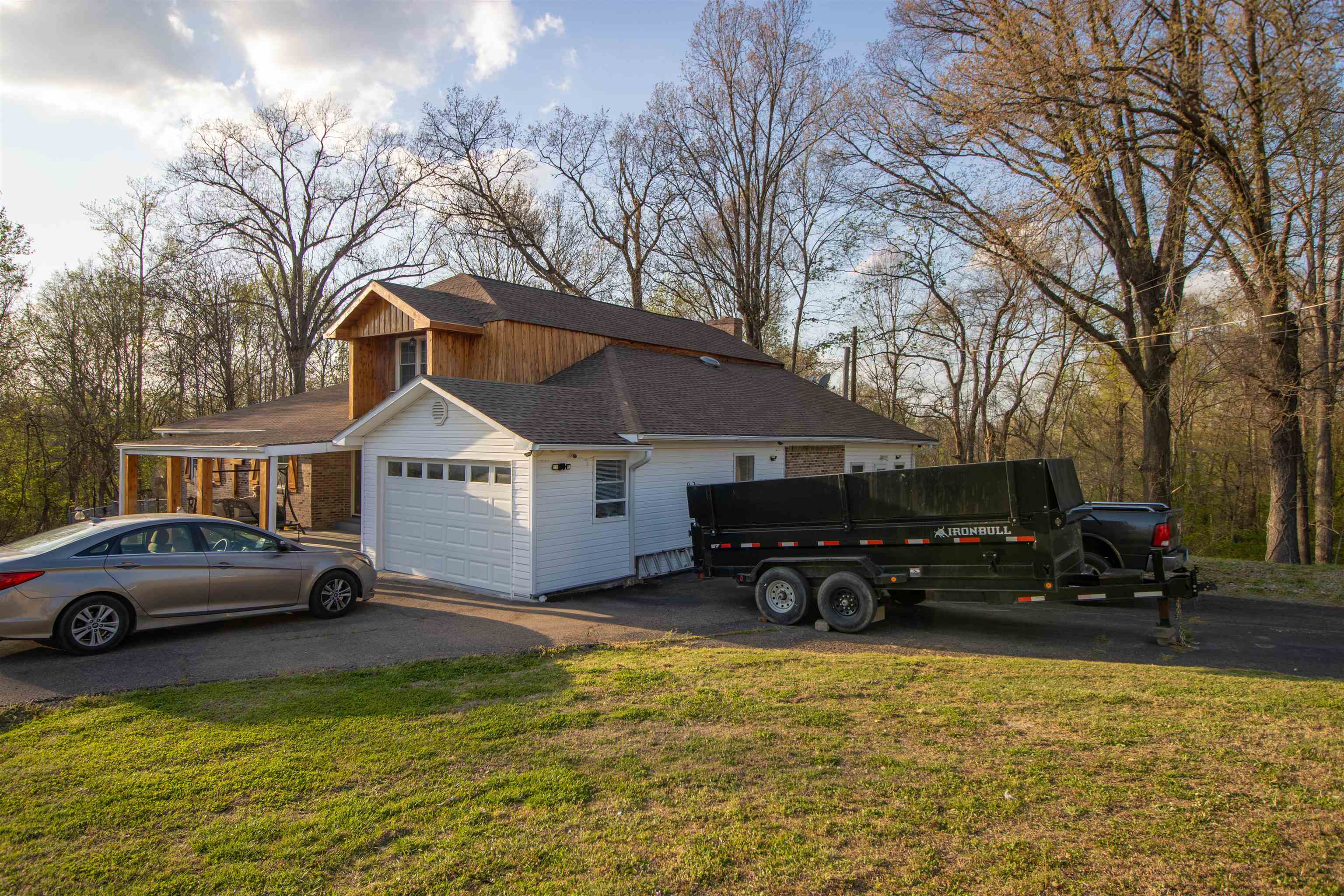 127 Harvey Newman Road Gates, TN 38037 - Photo 6 of 40 a view of house with car parked in front of it