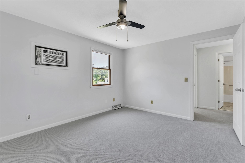 56-58 Arthur Street Springfield, MA 01104 - Photo 23 of 42 a view of an empty room with a window