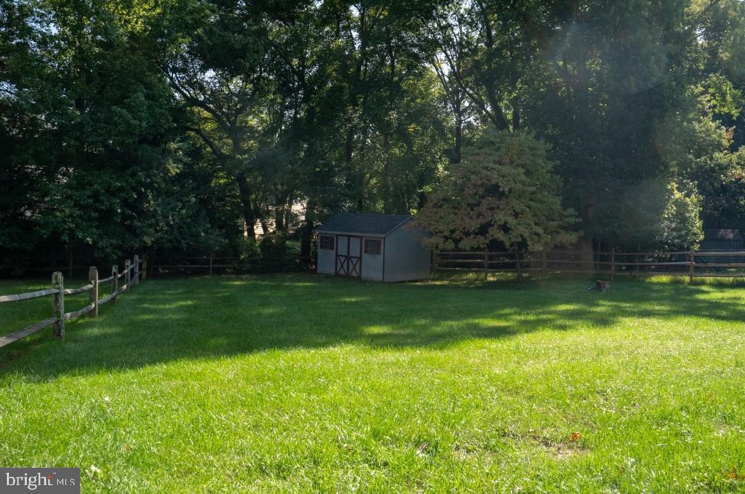 14913 Lear Lane Silver Spring, MD 20905 - Photo 33 of 33 Serene backyard with lush greenery.
