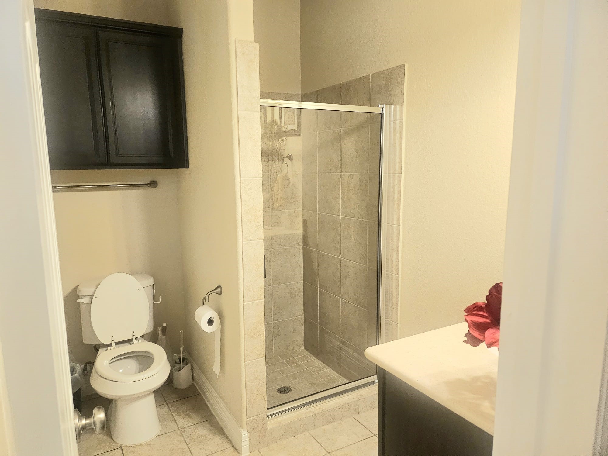 5206 Jacob Ridge Court Sugar Land, TX 77479 - Photo 19 of 42 a bathroom with a sink toilet and shower
