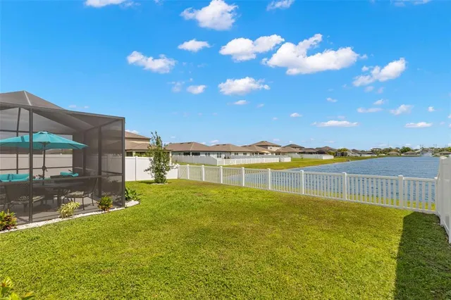 a view of a lake with a building in the background