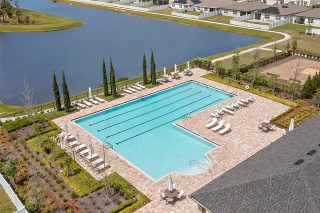 a view of a patio with two chairs and a table