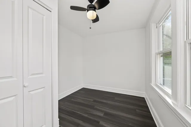 a bathroom with a toilet and a bathtub
