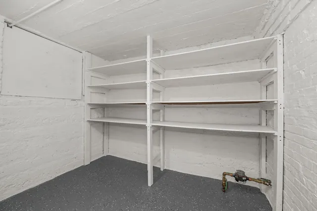 a view of a backyard with sitting area