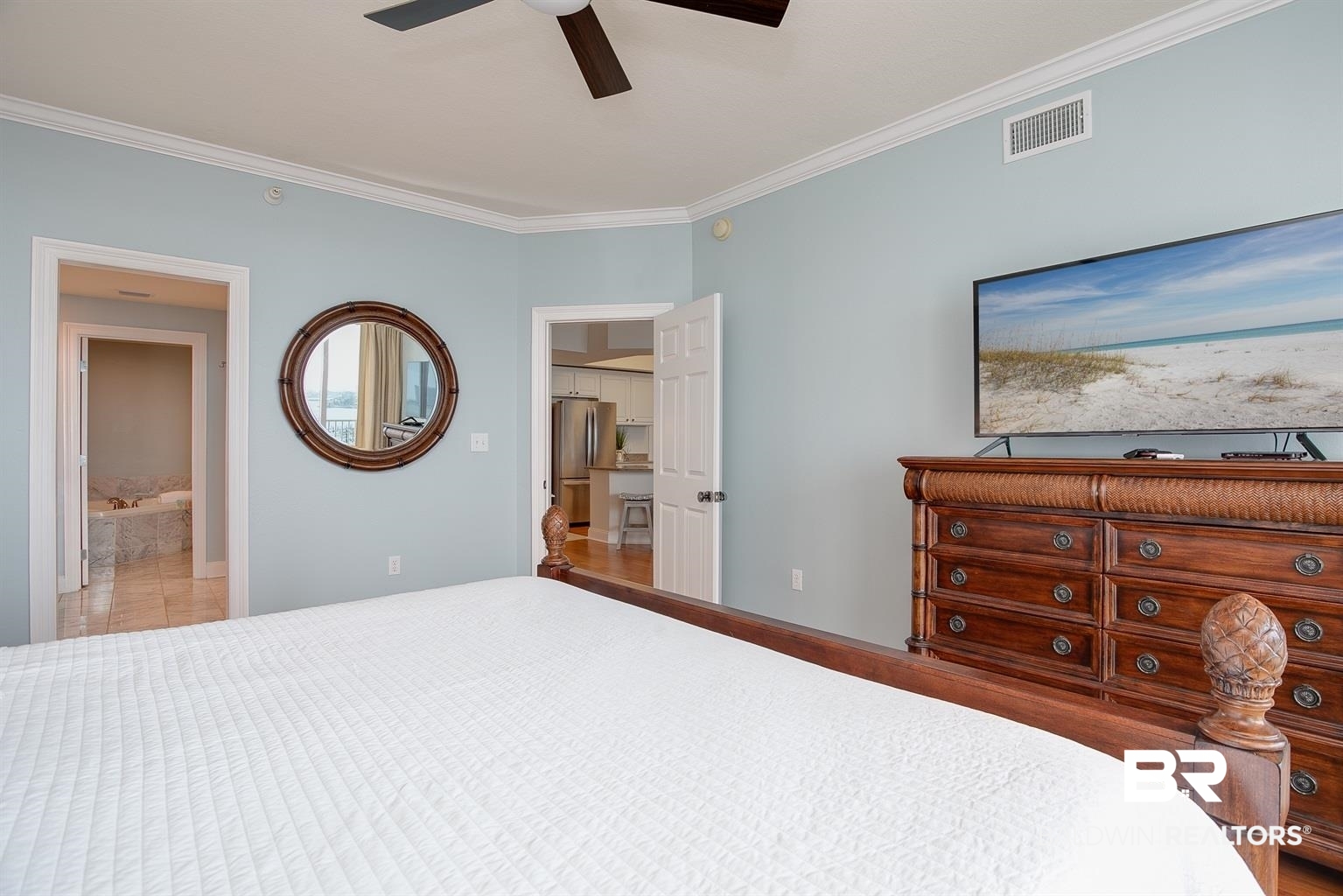 27800 Canal Road, Unit 411 Orange Beach, AL 36561 - Photo 20 of 49 Bedroom featuring light blue walls, crown molding, and a ceiling fan