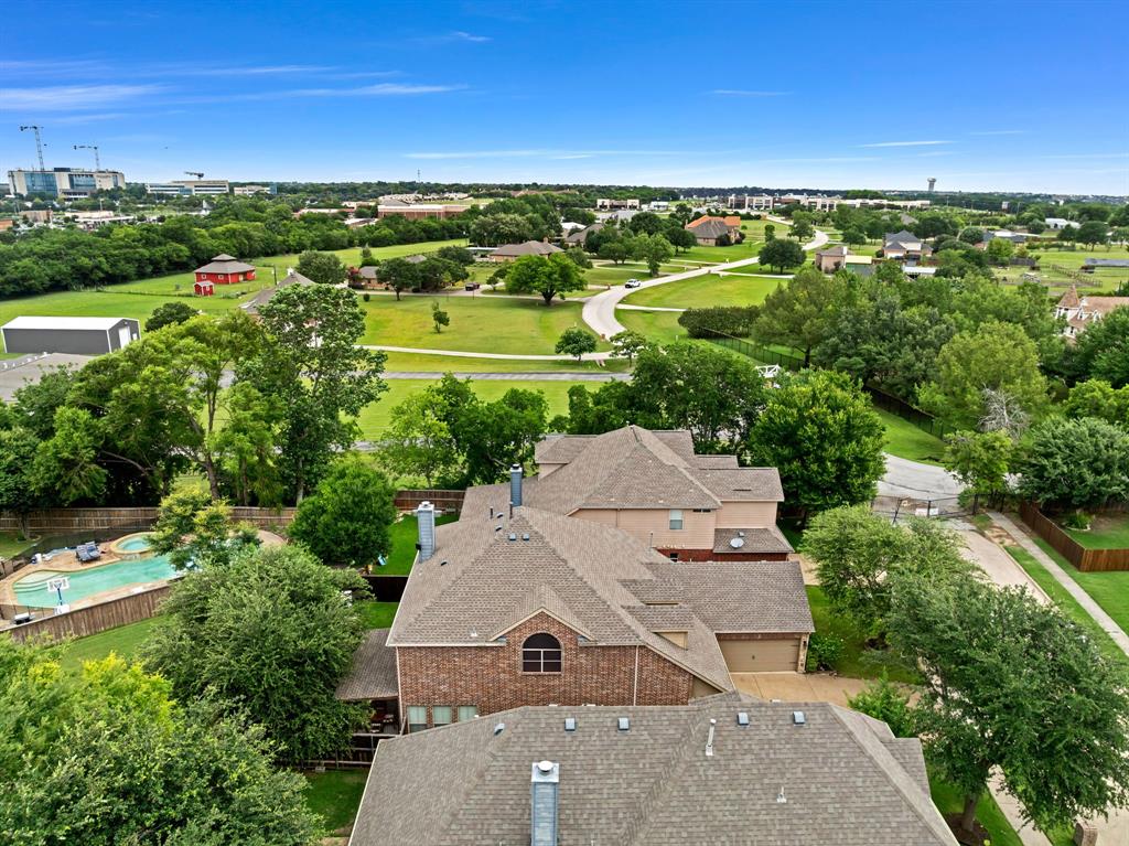 1701 Meadow Ranch Road McKinney, TX 75071 - Photo 36 of 40 an aerial view of a house with a yard