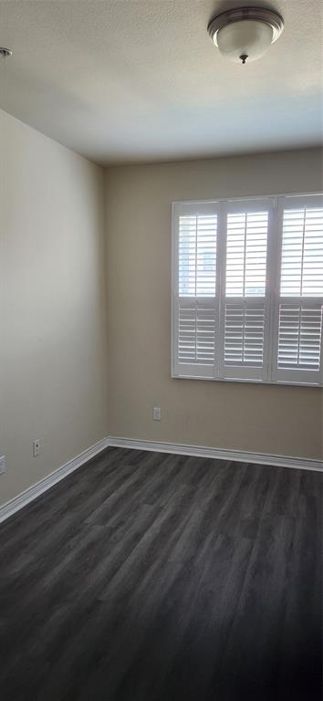 1100 West Trinity Mills Road, Unit 3029 Carrollton, TX 75006 - Photo 17 of 19 2nd Bedroom