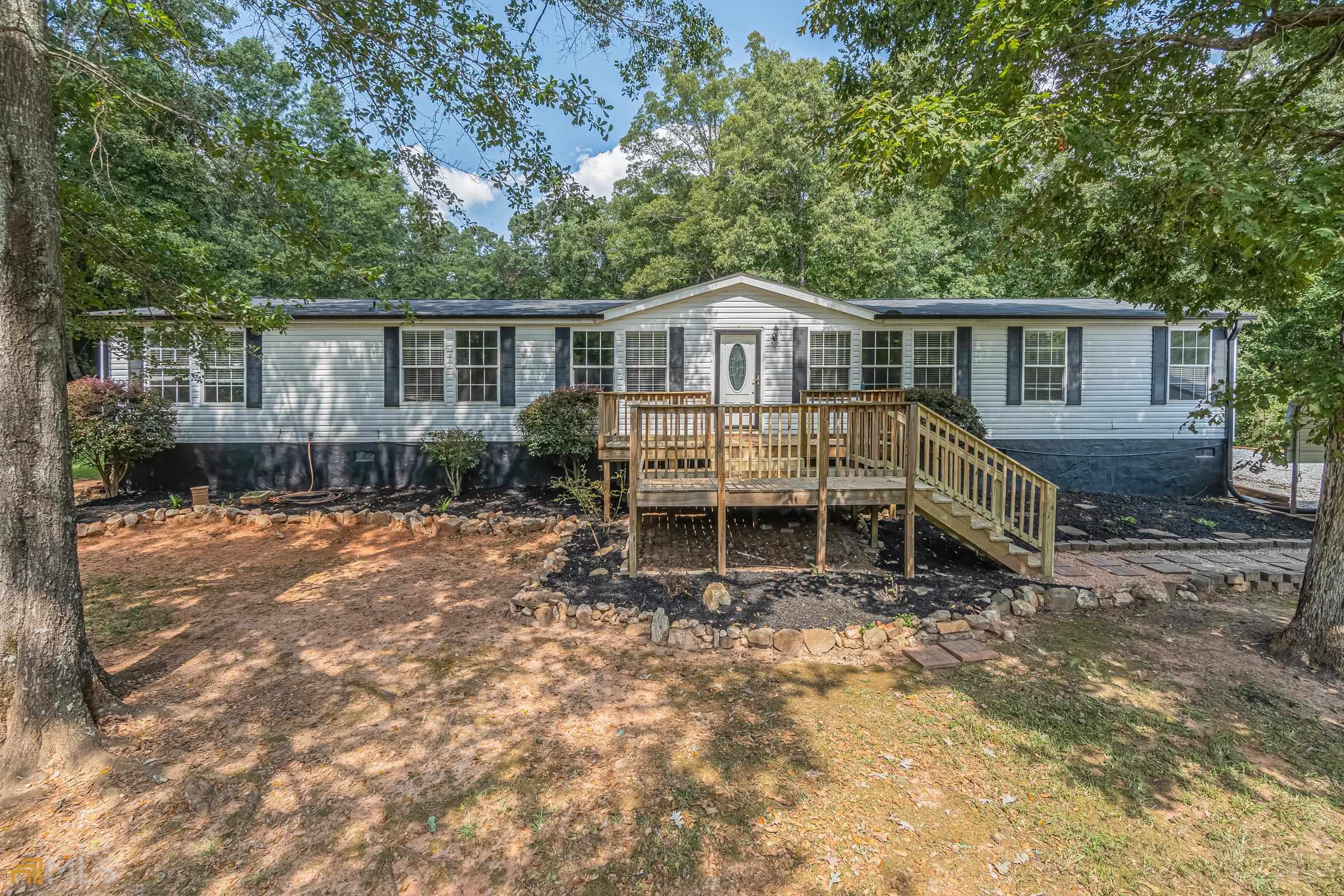 237 Drew Lane Athens, GA 30607 - Photo 1 of 1 a view of a house with a yard