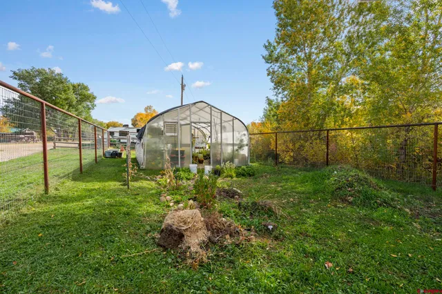 a view of a lake with a house