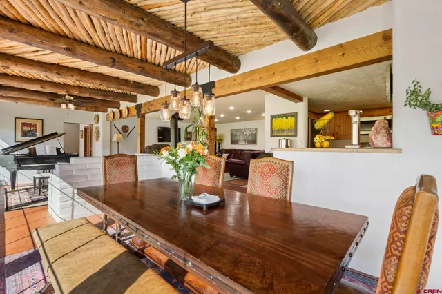 a view of a dining room with furniture