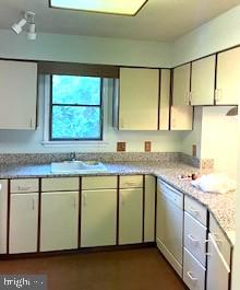 16 Colgate Drive Rehoboth Beach, DE 19971 - Photo 11 of 28 Bright and functional kitchen space.