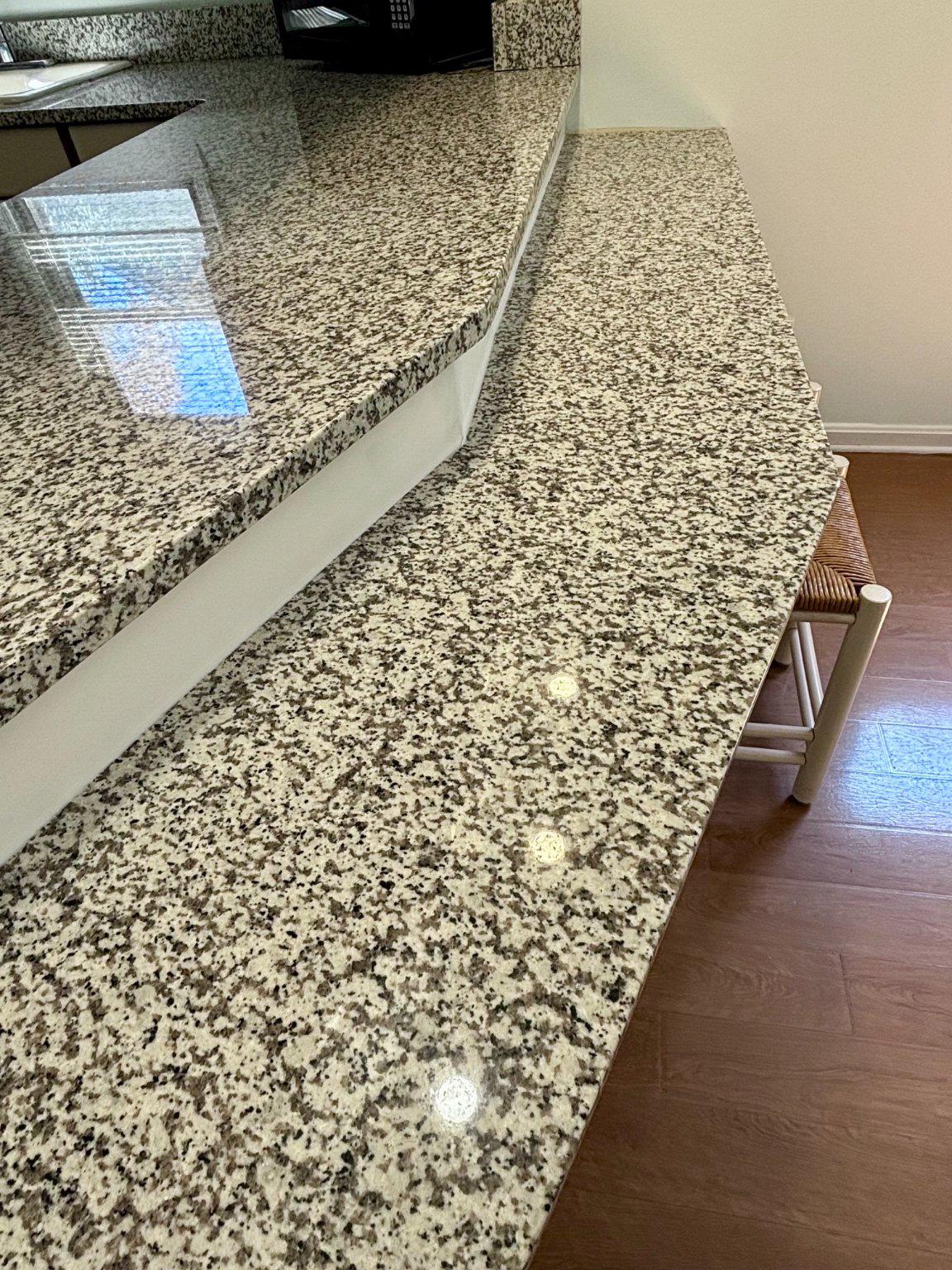 16 Colgate Drive Rehoboth Beach, DE 19971 - Photo 13 of 28 Granite countertops and breakfast bar