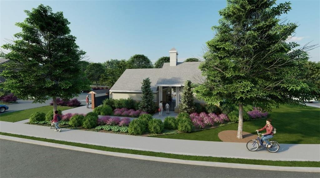 3197 Eastham Run Drive Dacula, GA 30019 - Photo 32 of 34 a front view of a house with a garden and plants