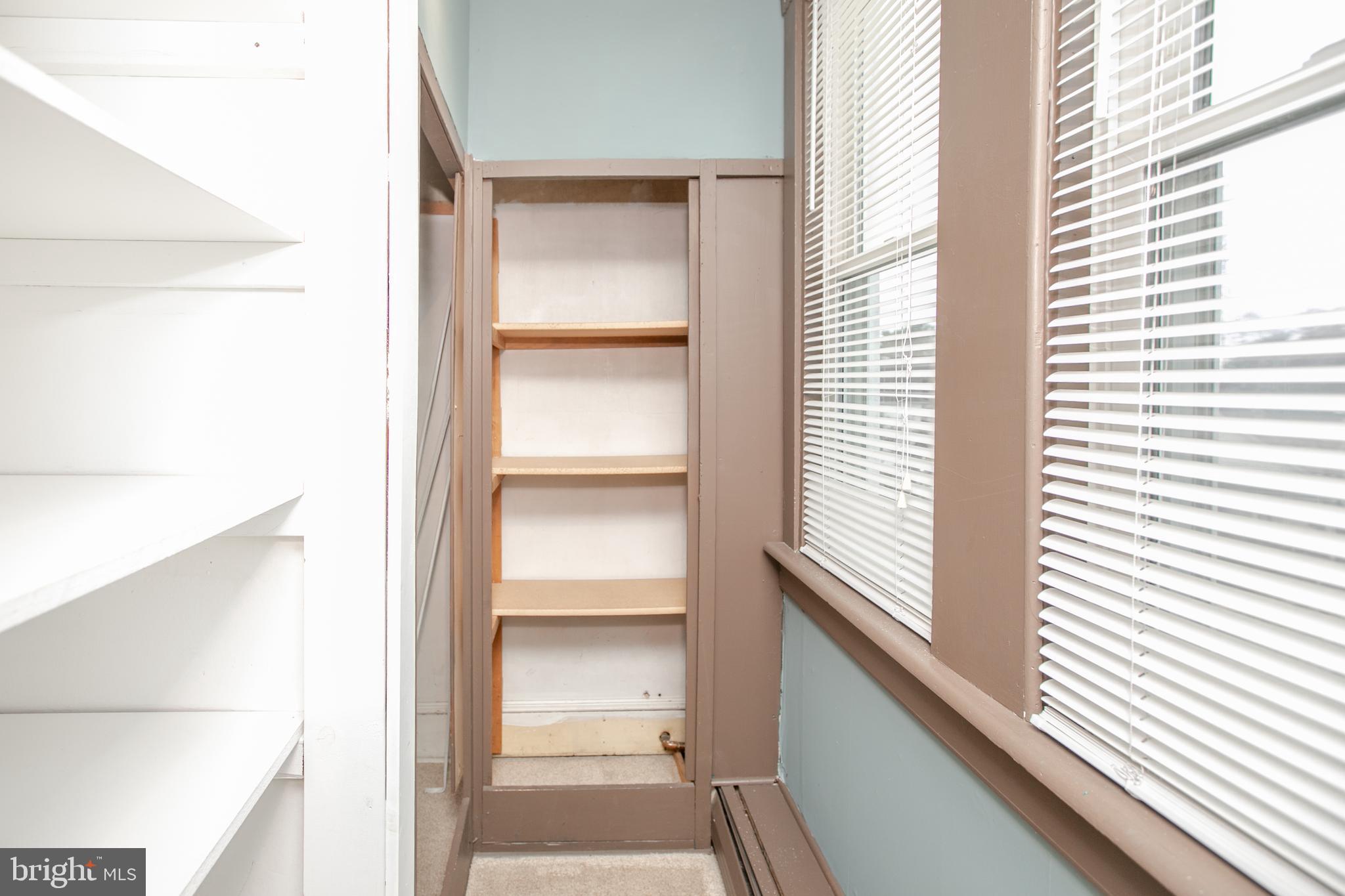 2414 Hamilton Avenue Hamilton, NJ 08619 - Photo 17 of 31 a view of a hallway with a window