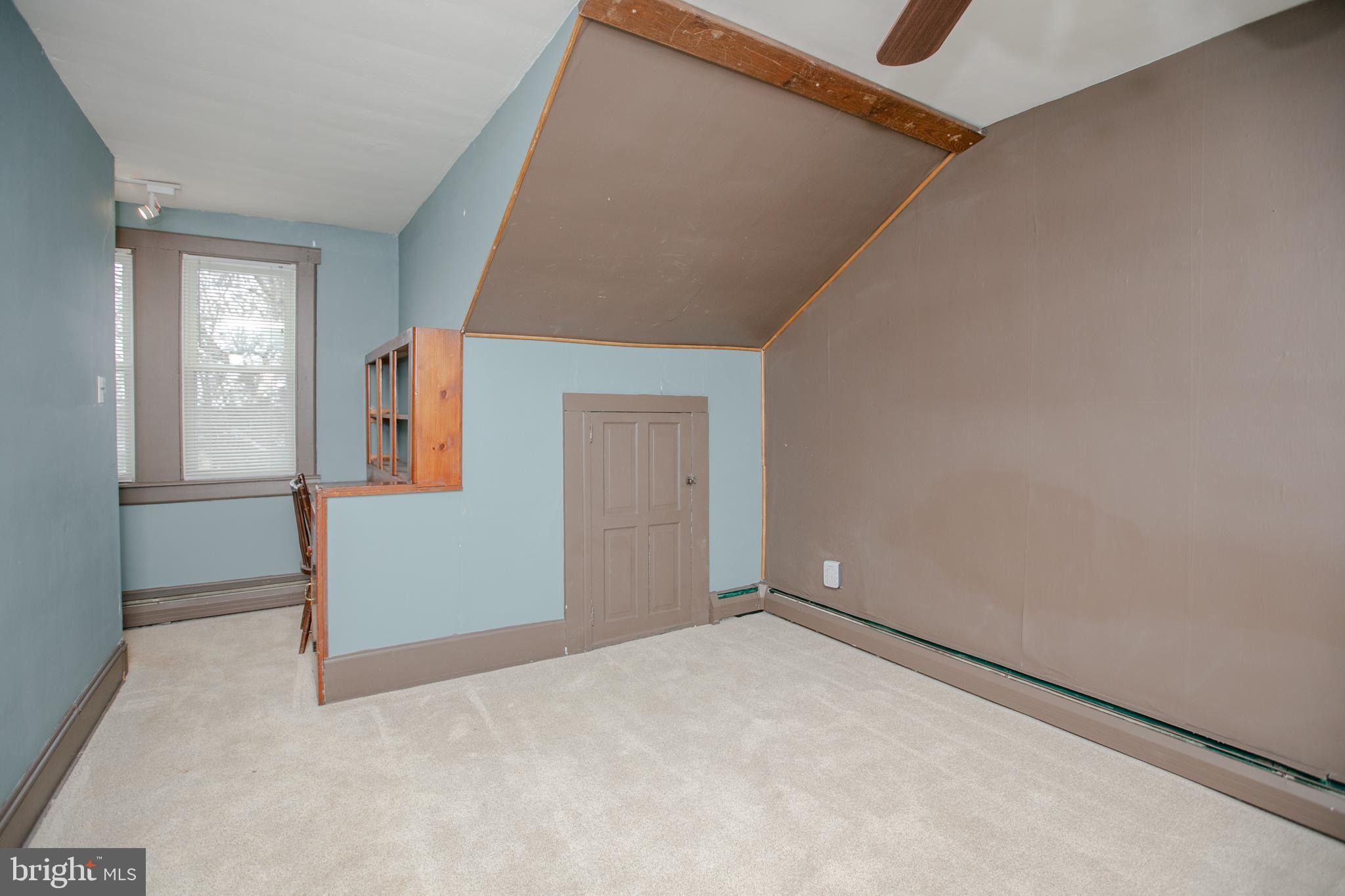 2414 Hamilton Avenue Hamilton, NJ 08619 - Photo 20 of 31 a view of an empty room with wooden floor and a window
