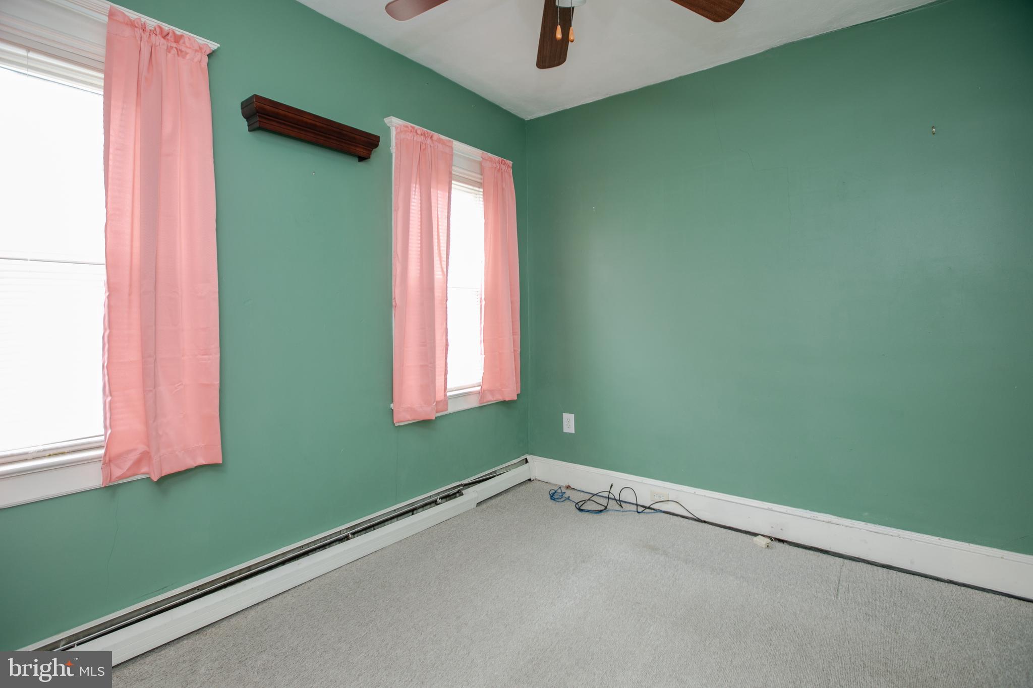 2414 Hamilton Avenue Hamilton, NJ 08619 - Photo 25 of 31 a view of a room that has a window and a fan
