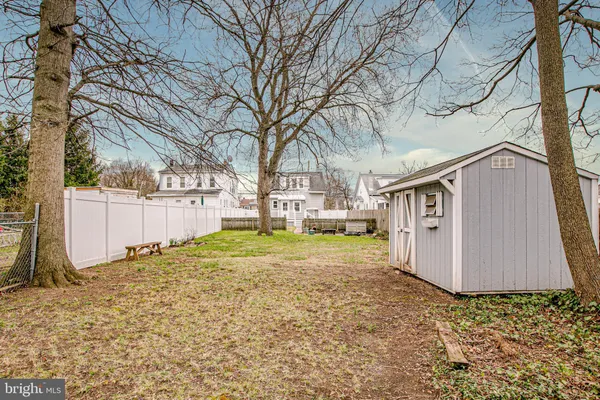 a view of a back yard of the house