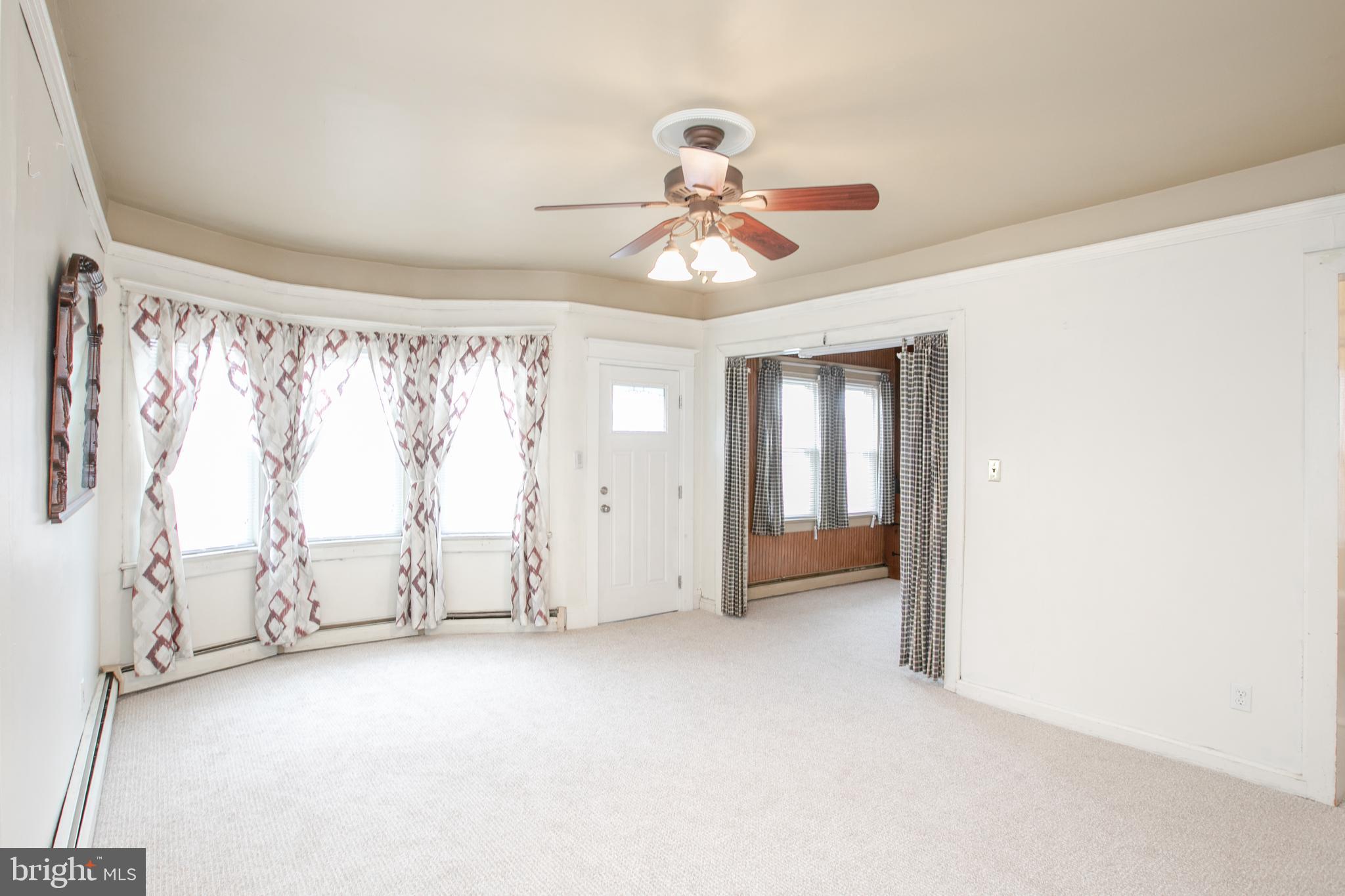 2414 Hamilton Avenue Hamilton, NJ 08619 - Photo 6 of 31 a view of room with window and ceiling fan