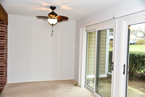 1560 7 Pines Road, Unit C1 Schaumburg, IL 60193 - Photo 4 of 17 a painting on the wall of a room