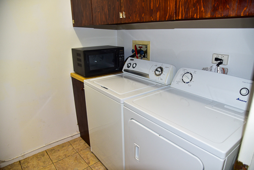1560 7 Pines Road, Unit C1 Schaumburg, IL 60193 - Photo 8 of 17 a utility room with dryer and washer