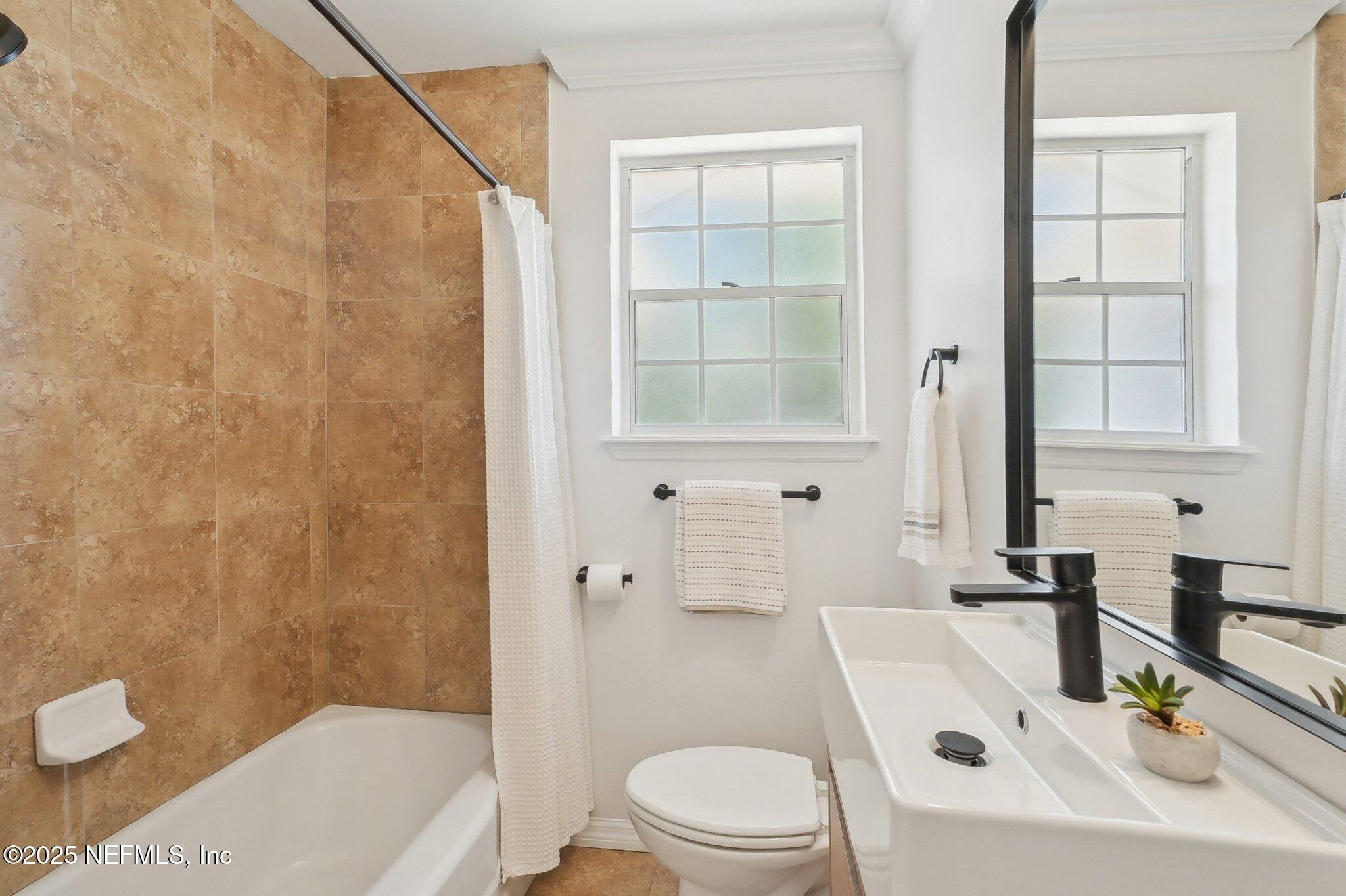 4704 Nottingham Road Jacksonville, FL 32210 - Photo 27 of 37 Guest Bathroom