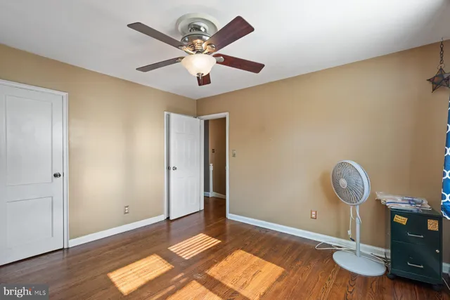 a view of workspace with wooden floor