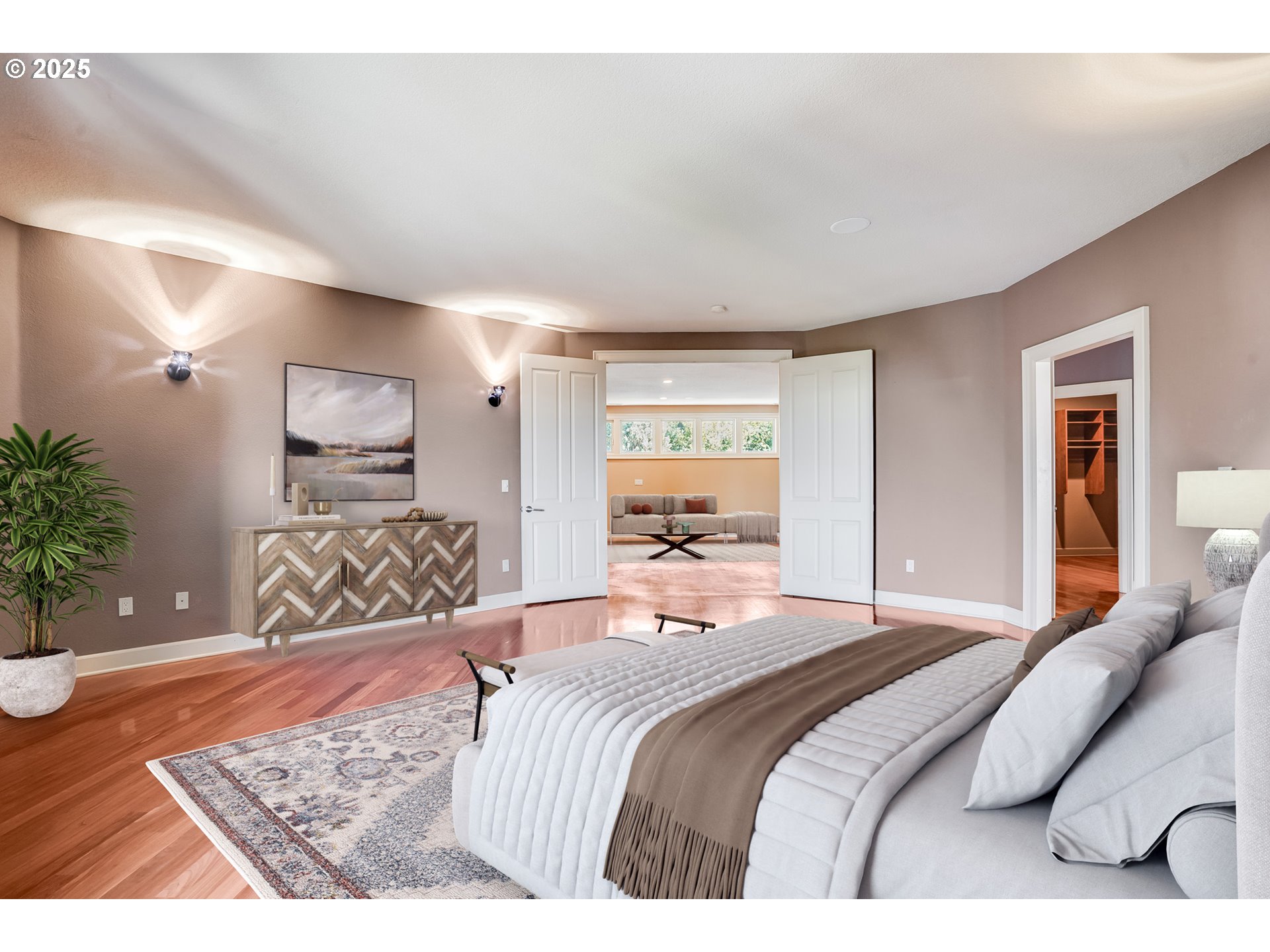 9309 Northwest Finzer Court Portland, OR 97229 - Photo 16 of 43 a bedroom with a bed a couch and potted plant with the wooden floor
