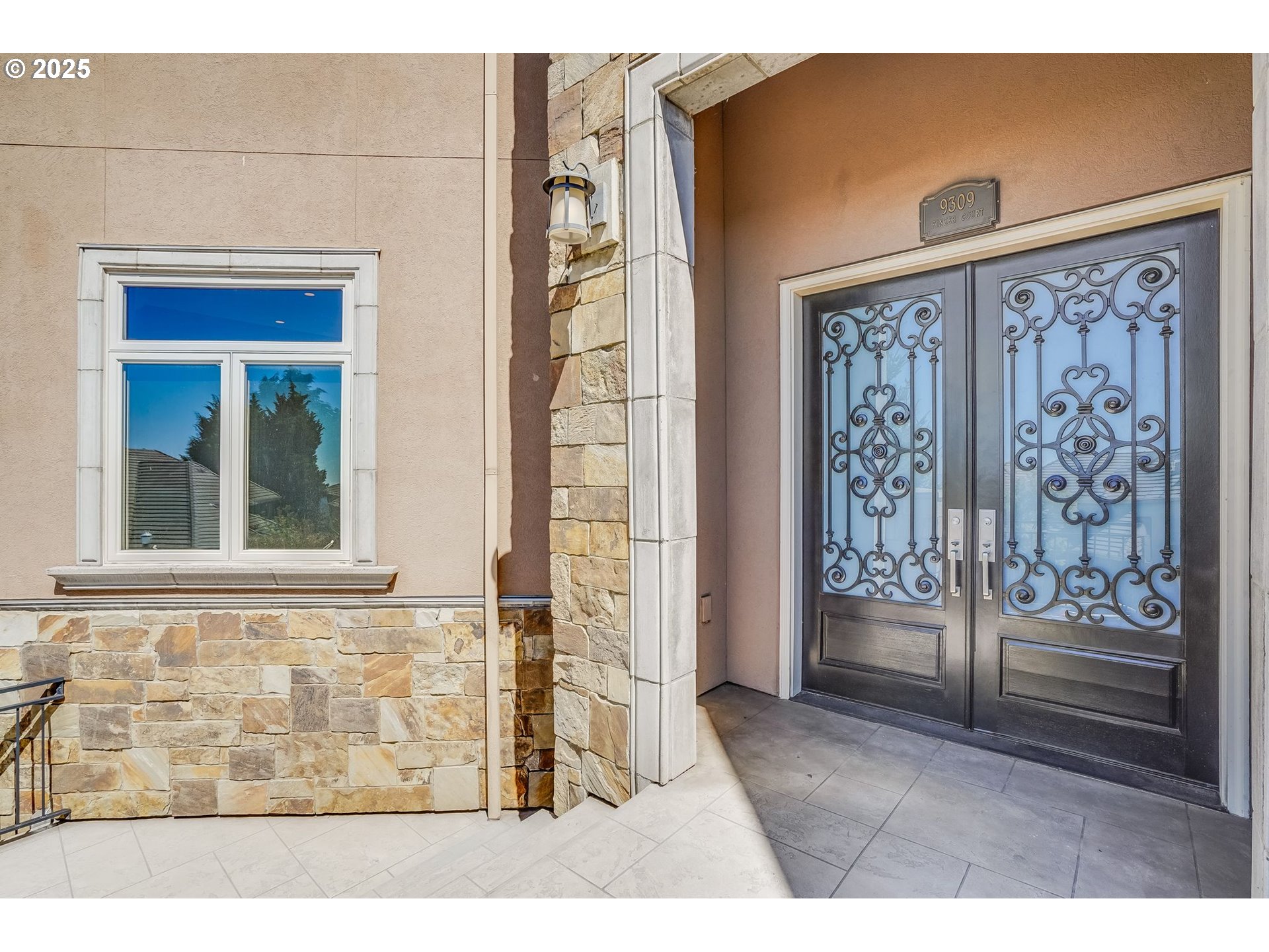 9309 Northwest Finzer Court Portland, OR 97229 - Photo 2 of 43 a view of a door and a window