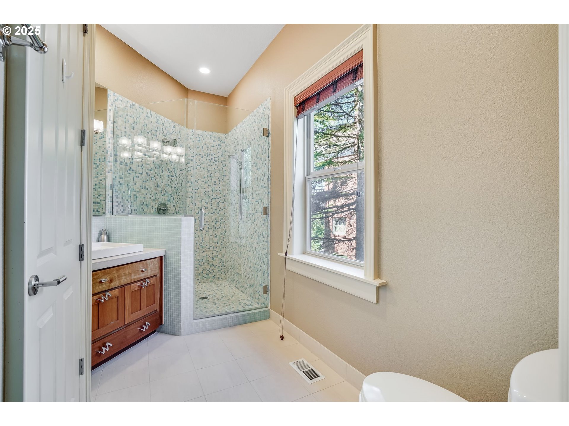 9309 Northwest Finzer Court Portland, OR 97229 - Photo 21 of 43 a bathroom with a toilet sink and shower