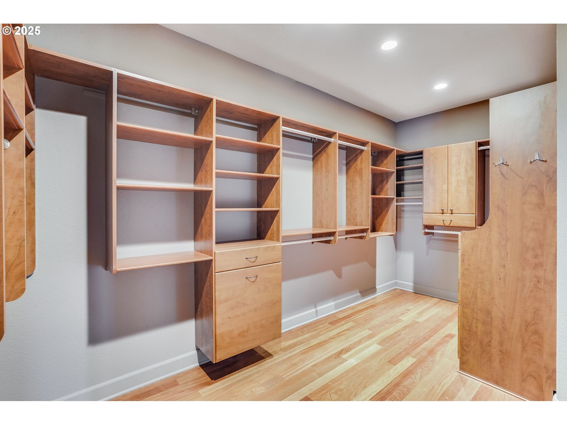 9309 Northwest Finzer Court Portland, OR 97229 - Photo 24 of 43 a kitchen with cabinets and refrigerator