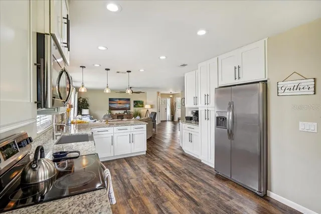 a bed room with furniture and a window