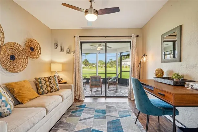 a workspace with furniture and wooden floor