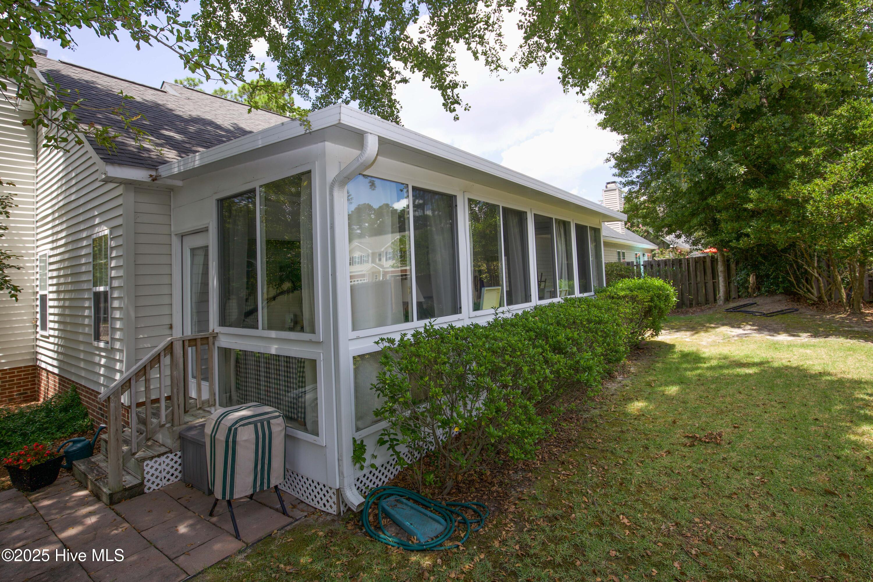 207 Kinloch Way Aberdeen, NC 28315 - Photo 29 of 38 Sunroom from outside