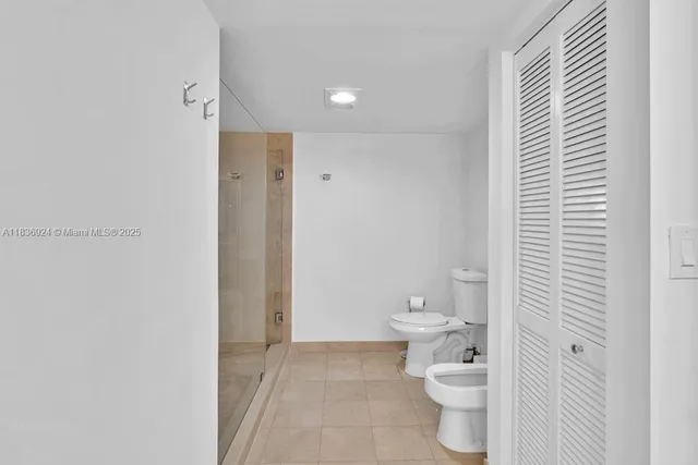 a view of a livingroom with furniture and a window