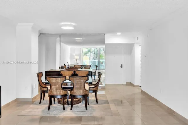 a kitchen with stainless steel appliances a refrigerator sink and cabinets