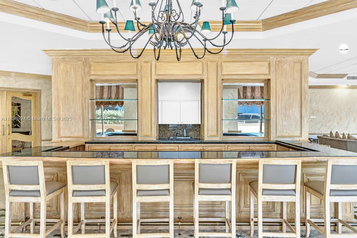 8855 Collins Avenue, Unit 2F Surfside, FL 33154 - Photo 67 of 79 a view of a building with a window and front door