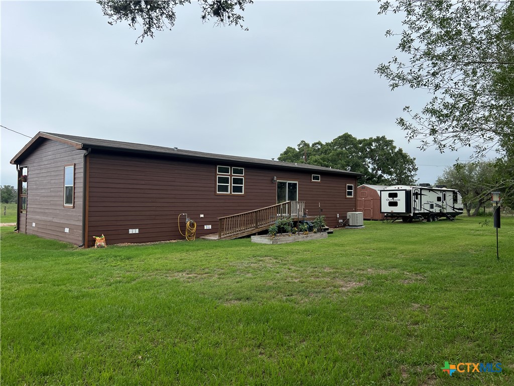 1385 Bego Road Goliad, TX 77963 - Photo 10 of 44 Camper hook up on end of home by guest house