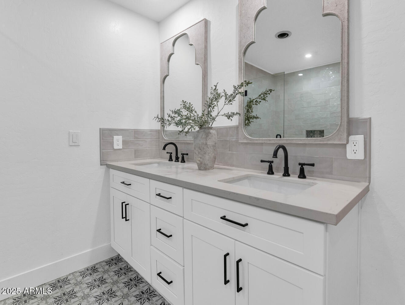 4642 North 31st Street Phoenix, AZ 85016 - Photo 15 of 50 a bathroom with a sink vanity and a mirror